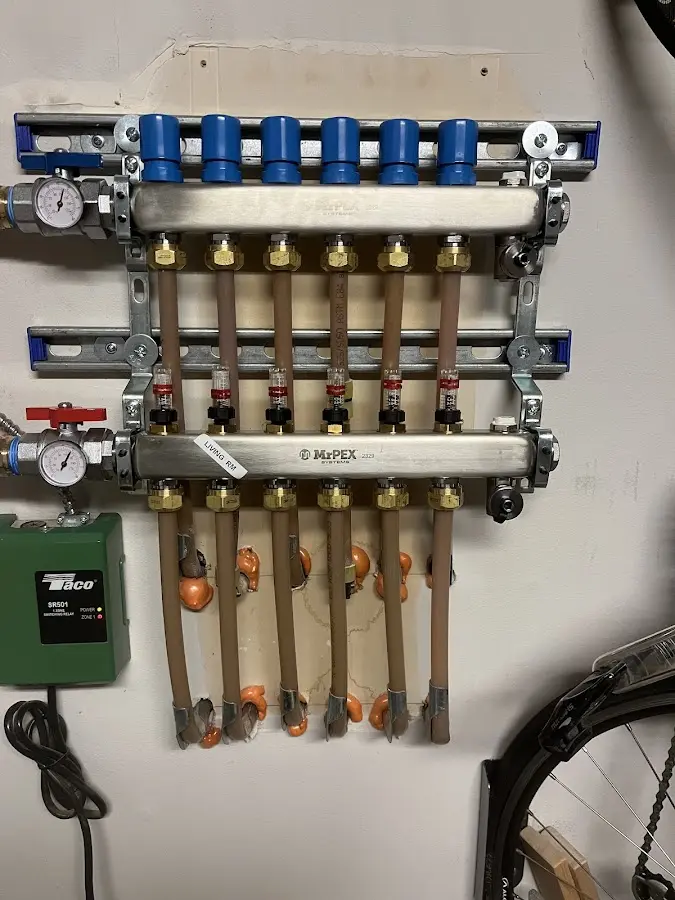 Plumber performing Water Heater Repair at a residential property in San Juan